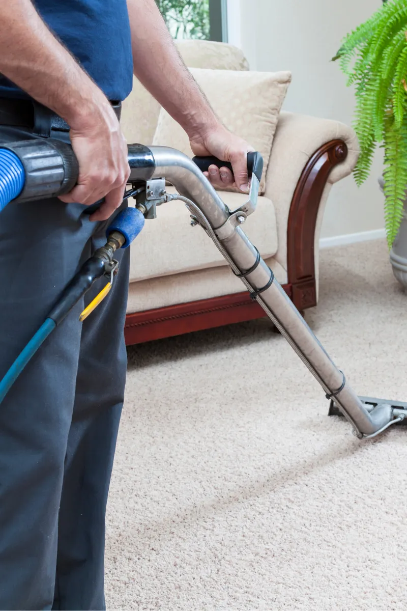 man cleaning the floor